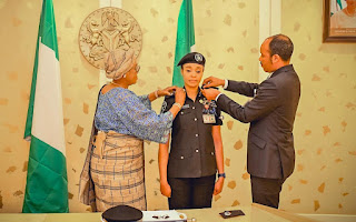 Nigerian First Lady Decorates Newly Promoted Officer From Her Office